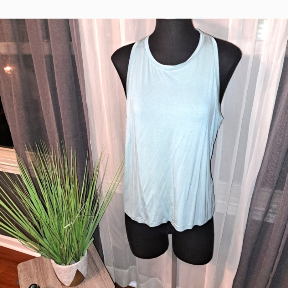 Light Blue Dri- Fit Racerback tank. SIZE large- NEVER WORN- NO TAGS
